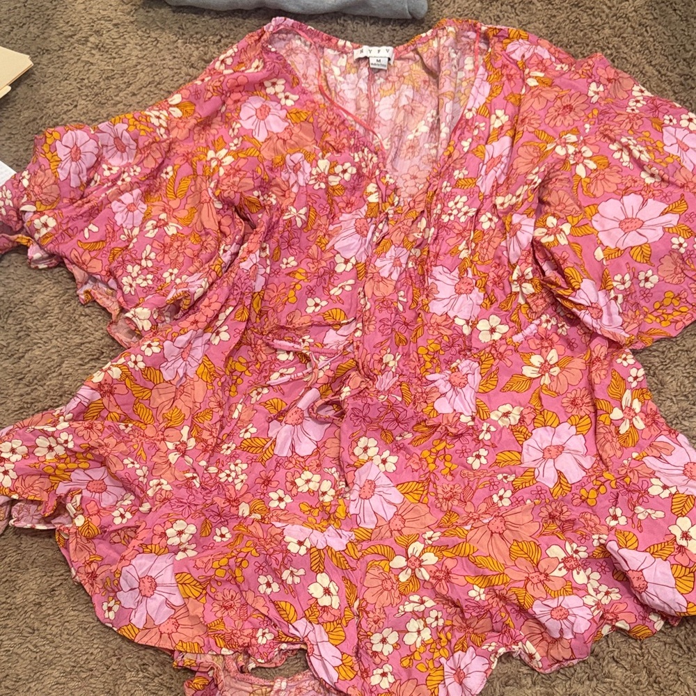 Pink Floral V-Neck Romper with Ruffle Hem